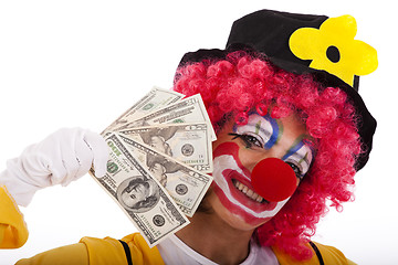 Image showing Funny clown holding money