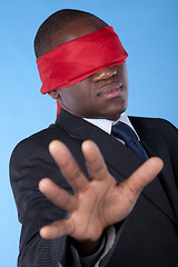 Image showing blindfold african businessman