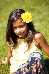 Image showing Child with a flower