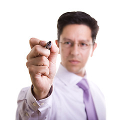 Image showing businessman writing at a whiteboard