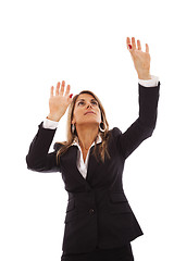 Image showing Businesswoman reaching something