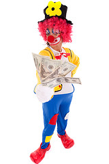 Image showing Funny clown holding money