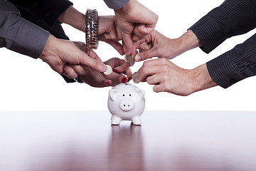 Image showing Group of people saving money