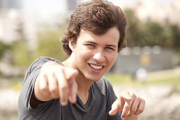 Image showing Teenager pointing to you