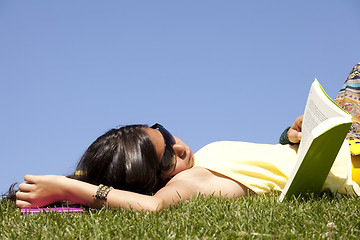 Image showing Children reading a book