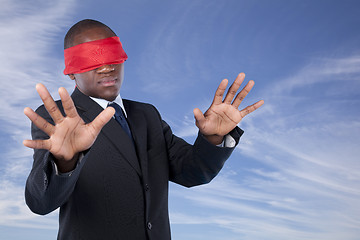 Image showing blindfold african businessman