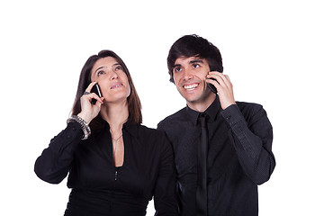 Image showing Men and woman talking on the phone