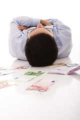 Image showing Sleeping with the money