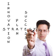 Image showing Businessman solving a strategy plan
