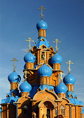 Image showing Wooden Church with Blue Domes