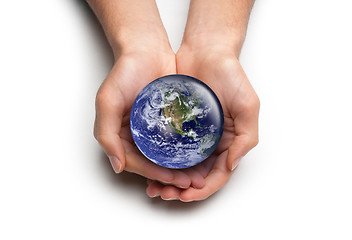 Image showing Hands caring for the Earth