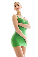 Image showing young woman in green slip