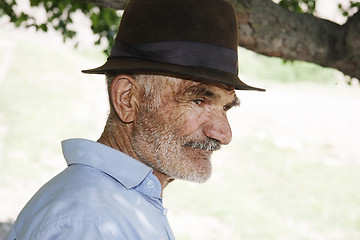 Image showing Elederly man in hat profile view