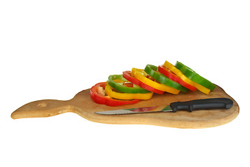 Image showing Cutting board with sliced  bell pepper and knife