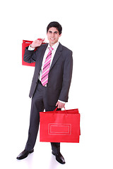 Image showing handsome man with shopping bags