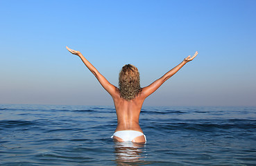 Image showing topless in water 