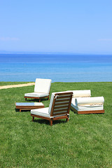 Image showing Sunbeds at the beach of luxury hotel