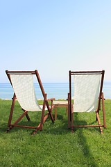 Image showing Sunbeds at the beach of luxury hotel