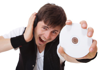 Image showing Young guy holding a compact disc