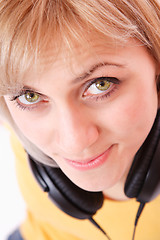 Image showing Woman with headphones listening to music