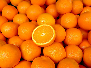 Image showing Orange cut in half