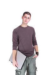 Image showing Handsome teenager boy student with laptop