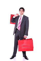 Image showing handsome man with shopping bags