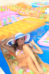 Image showing Young woman in the pool 