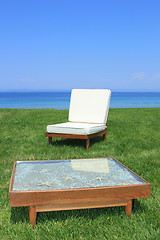 Image showing Sunbeds at the beach of luxury hotel