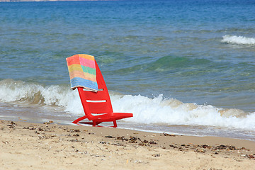 Image showing An empty chair on a  beach 