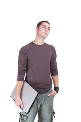 Image showing Handsome teenager boy student with laptop