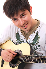 Image showing  playing classical acoustic guitar
