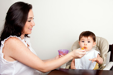 Image showing Funny baby messy eater