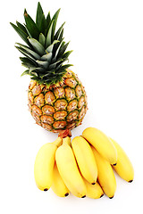 Image showing banana bunch with pineapple