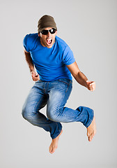 Image showing Young man jumping