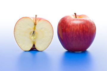 Image showing Half and whole apple