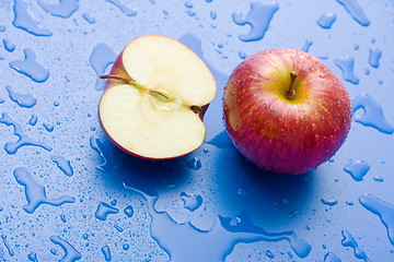 Image showing Half and whole apple