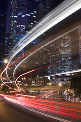 Image showing Modern Urban City with Freeway Traffic at Night