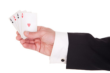 Image showing man's hand with four aces