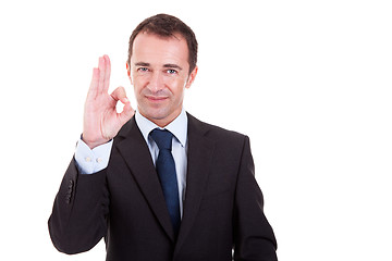 Image showing handsome businessman with thumb raised as a sign of ok