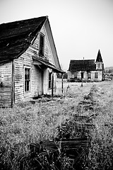 Image showing abandoned house and church