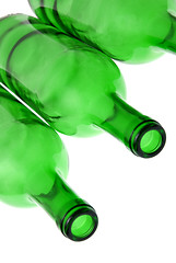 Image showing Detail of empty green glass wine bottles