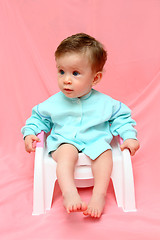 Image showing pretty baby sitting on chamber-pot