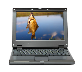 Image showing small laptop with fishing themes