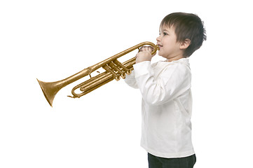 Image showing Boy playing on a trumpet