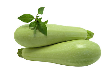 Image showing Two zucchini with basil