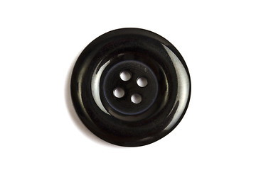 Image showing  Black clothing button isolated on white 