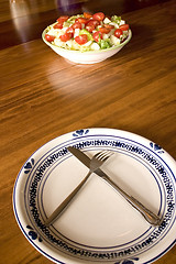 Image showing Bowl of Salad and an Empty Plate