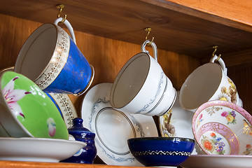 Image showing China Cabinet full of Cups