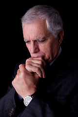 Image showing Portrait of a handsome mature businessman, thinking